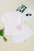 Simply Love bow print lettuce trim round neck top and shorts lounge set, featuring a stylish, comfortable matching sleepwear ensemble.