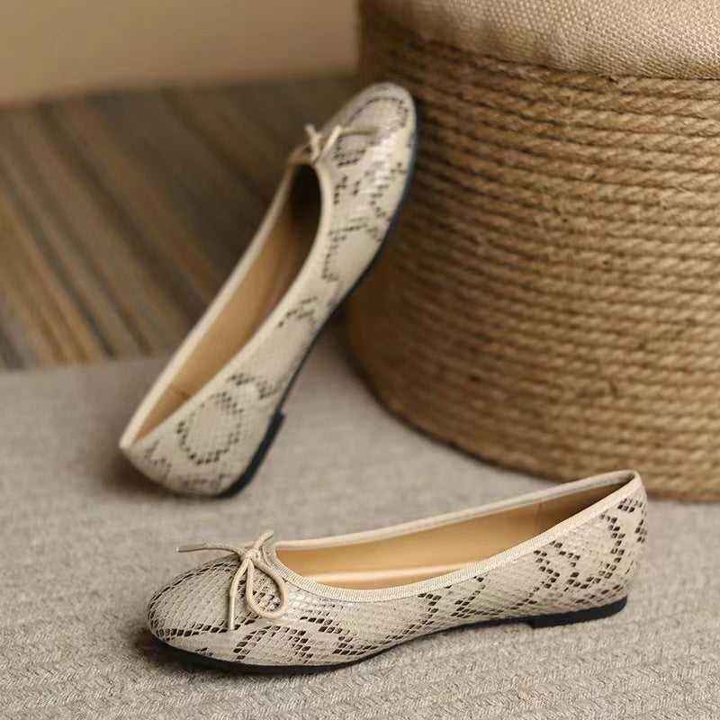 Plush Fashion Hub women's slip-on flats with egg-roll edges, round toe design, inspired by classic Chanel-inspired footwear.