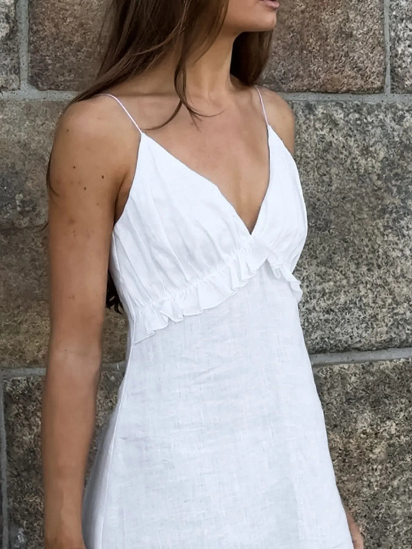 Women's ruffled V-neck cotton maxi dress by Trendsi featuring a flowy boho style and lightweight fabric, perfect for summer wear.