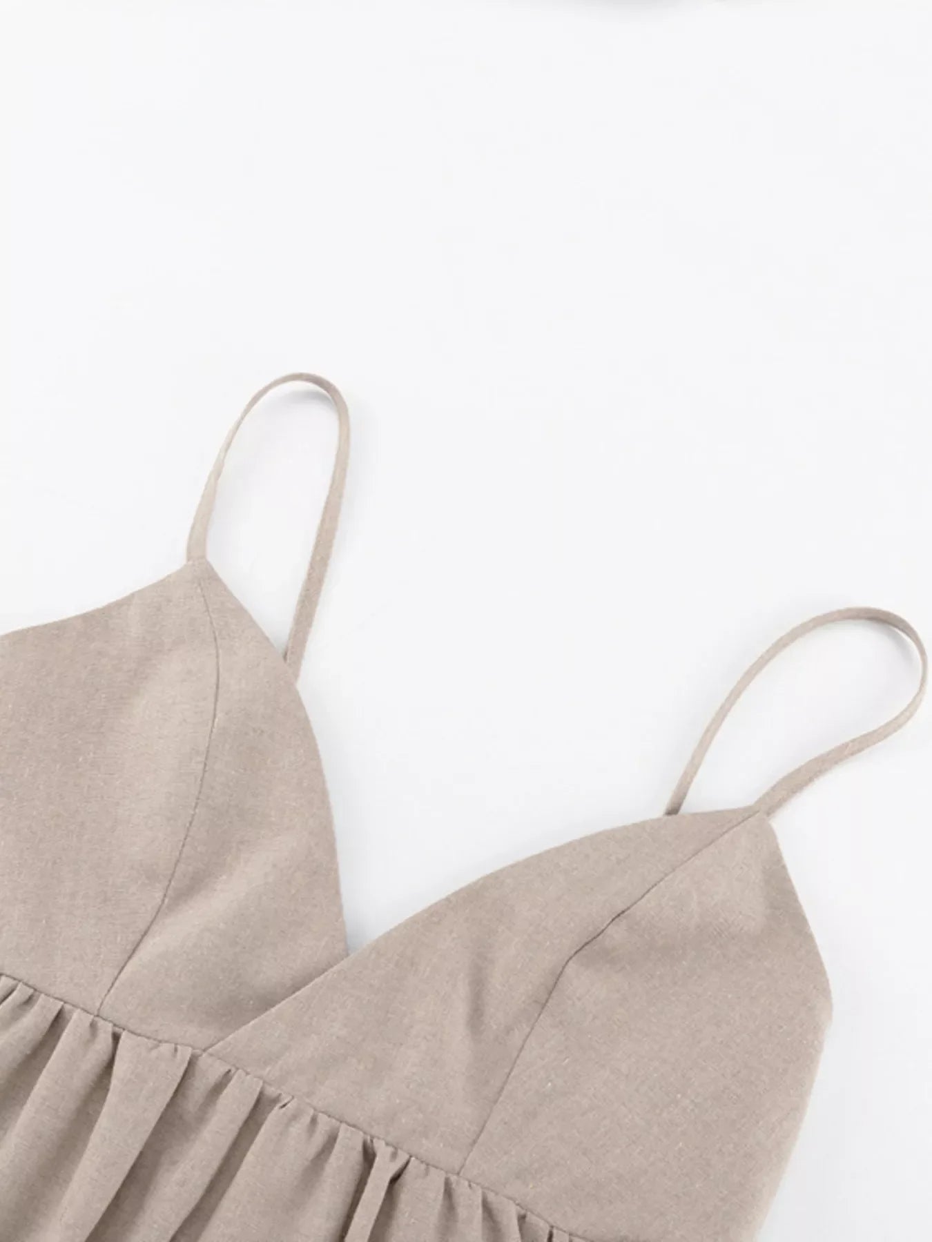 Backless spaghetti strap mini dress by Shopimist featuring a sleek, fitted silhouette and delicate shoulder straps.