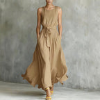 Women's lace-up waist-cinching sleeveless maxi dress by FitiqueFit, featuring a flowing fabric and elegant design.