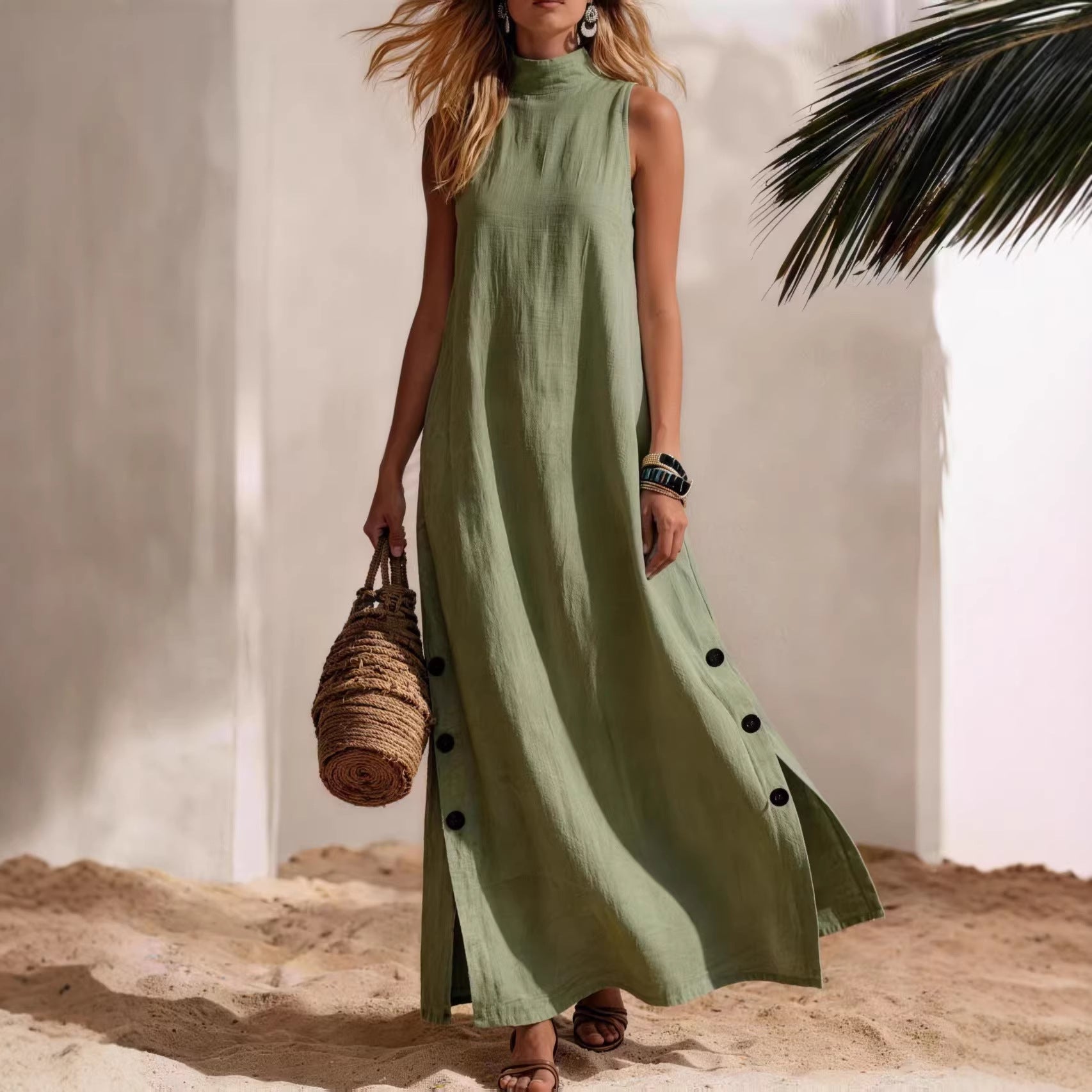 FitiqueFit sleeveless midi dress with side slits and a loose fit, shown on a model in a casual outdoor setting.