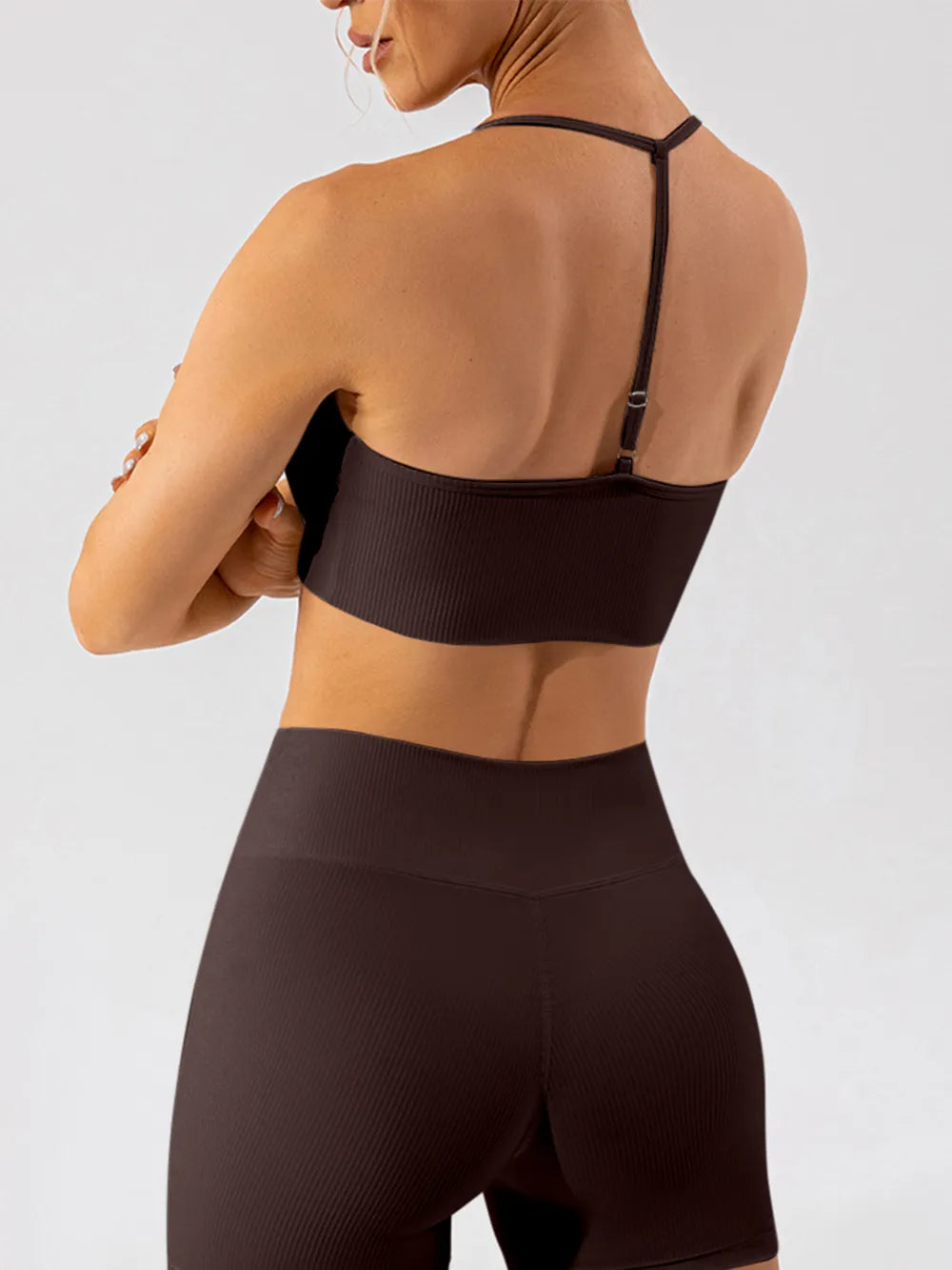 Trendsi Spaghetti Strap Active Bra in black, lightweight activewear with thin straps and supportive design for workouts.