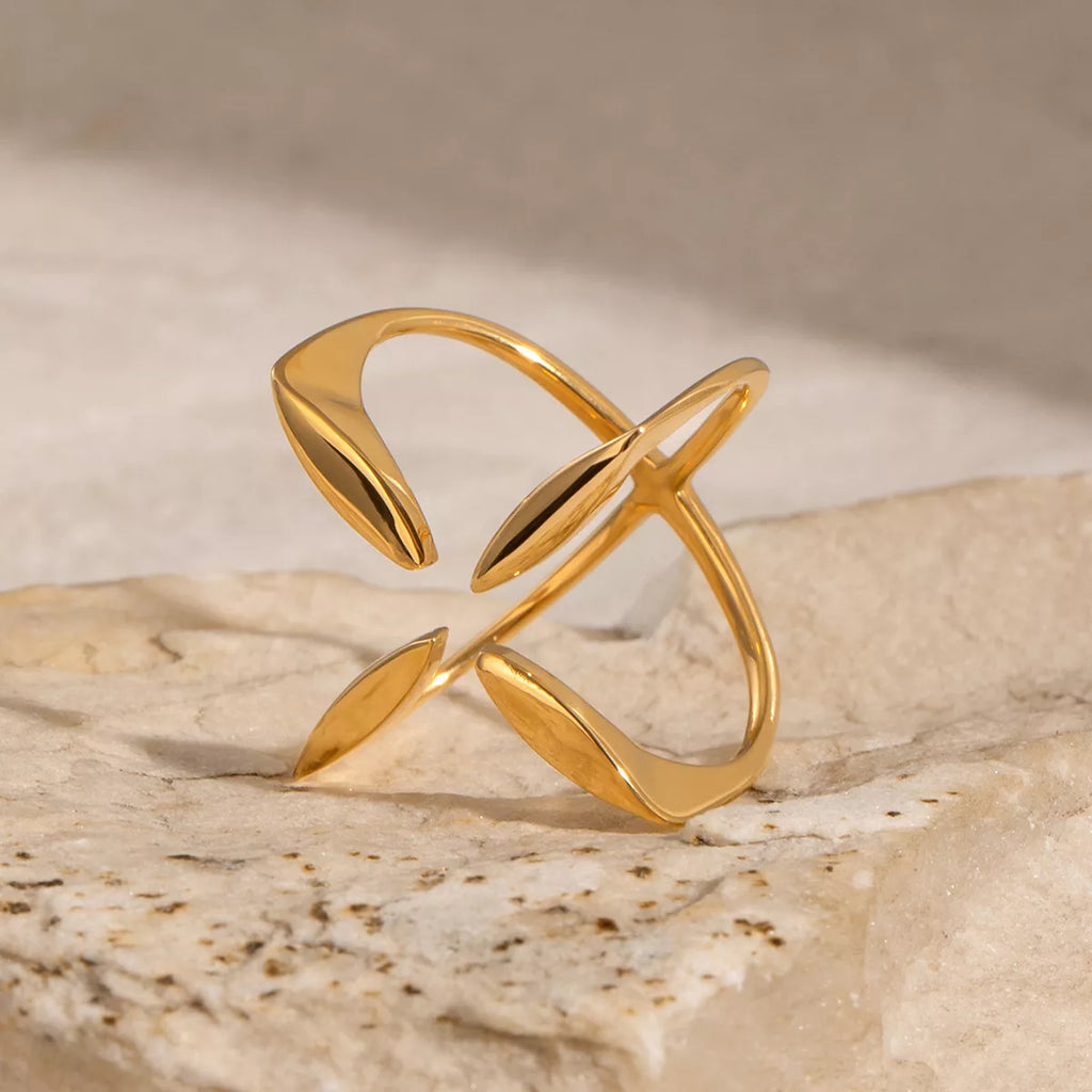 Stainless steel crisscross open ring by Shopimist featuring a sleek, modern design with intertwined bands and a polished finish.