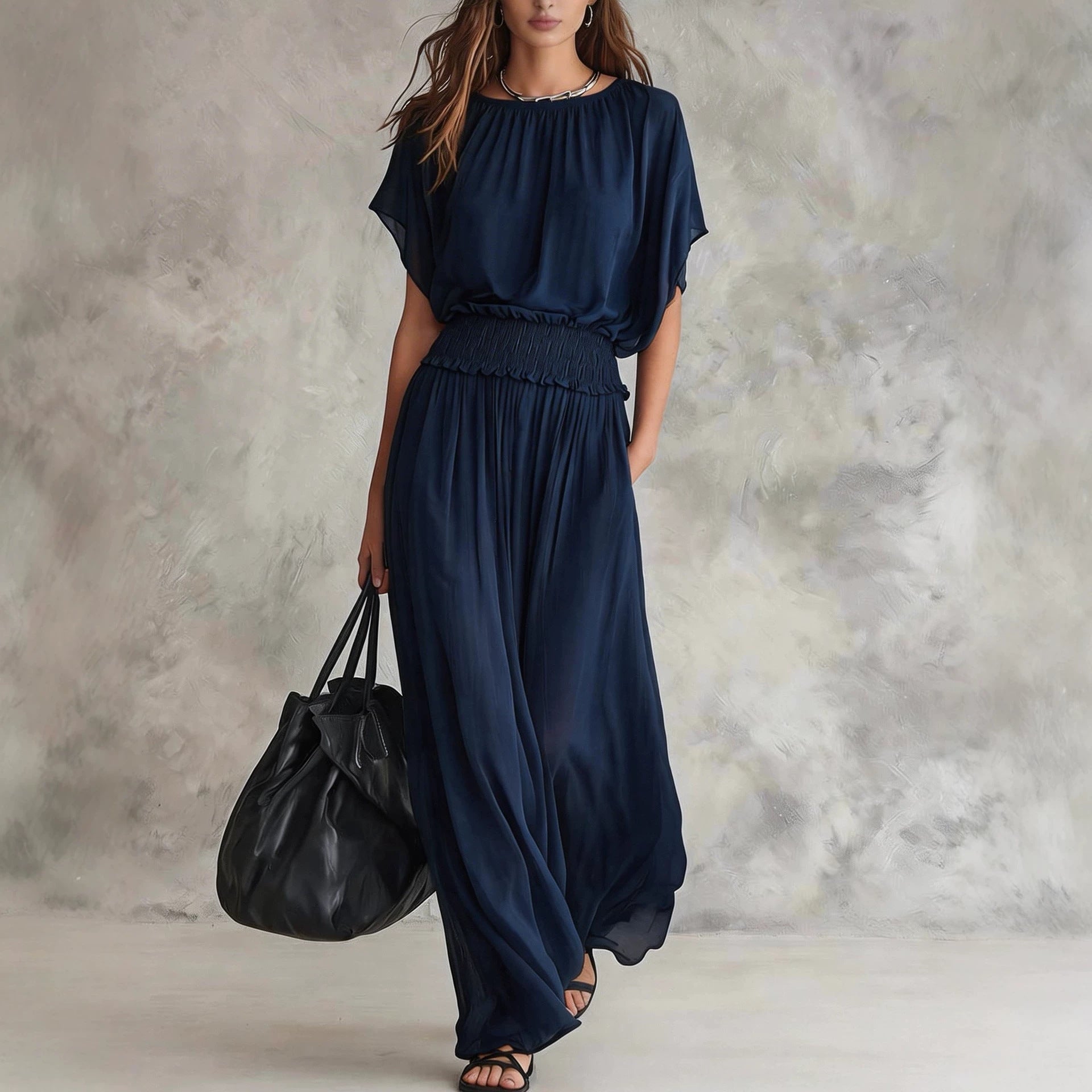 Women's chiffon high-waist ruched maxi dress by FitiqueFit, flowing fabric, sleeveless design, and elegant draping.
