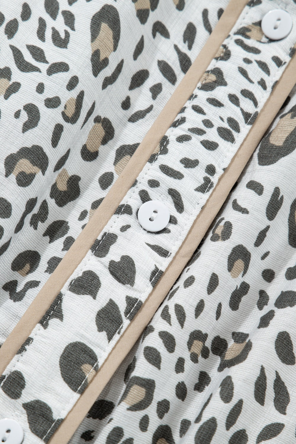 Women's leopard print button-down midi dress from Trendsi, casual chic viscose blend dress with long sleeves and stylish pattern.