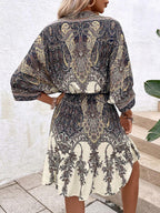 Paisley print batwing sleeve tassel tie front ruffle hem dress by FitiqueFit, casualwear with flowy silhouette and bohemian style.