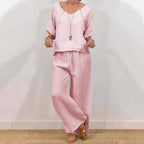 Women's multi-color two-piece casualwear set with V-neck top and matching pants by Plush Fashion Hub.