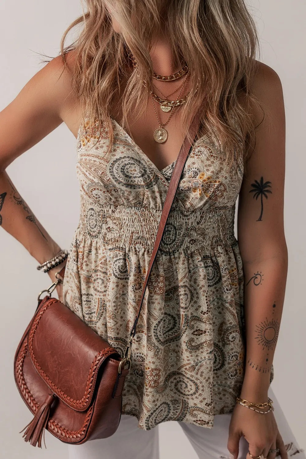 Paisley printed smocked babydoll camisole by Plush Fashion Hub, featuring a flowy design and adjustable straps.