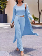 Trendsi round neck tank top, matching cardigan, and pants loungewear set laid flat on a white background.