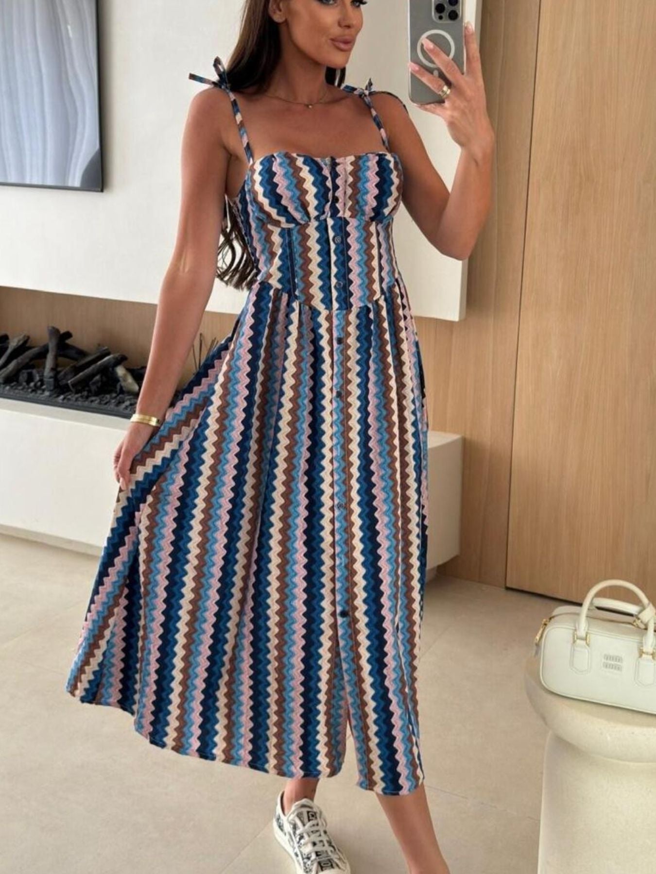 Women's striped tie-shoulder midi dress by Trendsi featuring casual summer style, perfect for brunch or warm-weather outings.