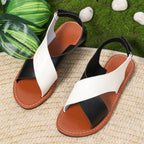 Women’s color-block cross-strap flat sandals by FitiqueFit, featuring vibrant straps and comfortable flat sole.