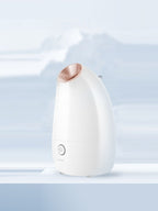 Professional automatic facial steamer from Trendsi for deep pore cleansing and skin hydration, shown with steam and sleek design.