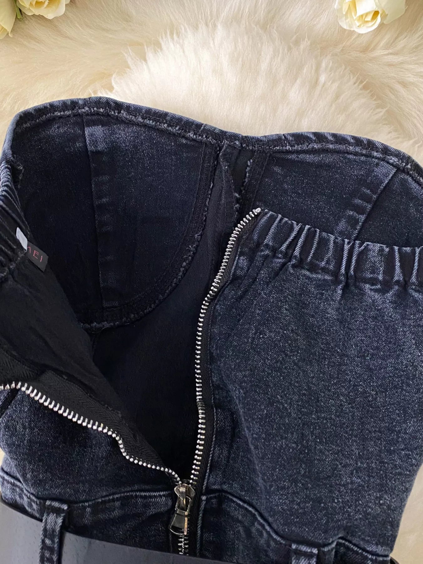 Plush Fashion Hub strapless denim romper with pockets, full-body suit, stylish casual wear, shown on a model.