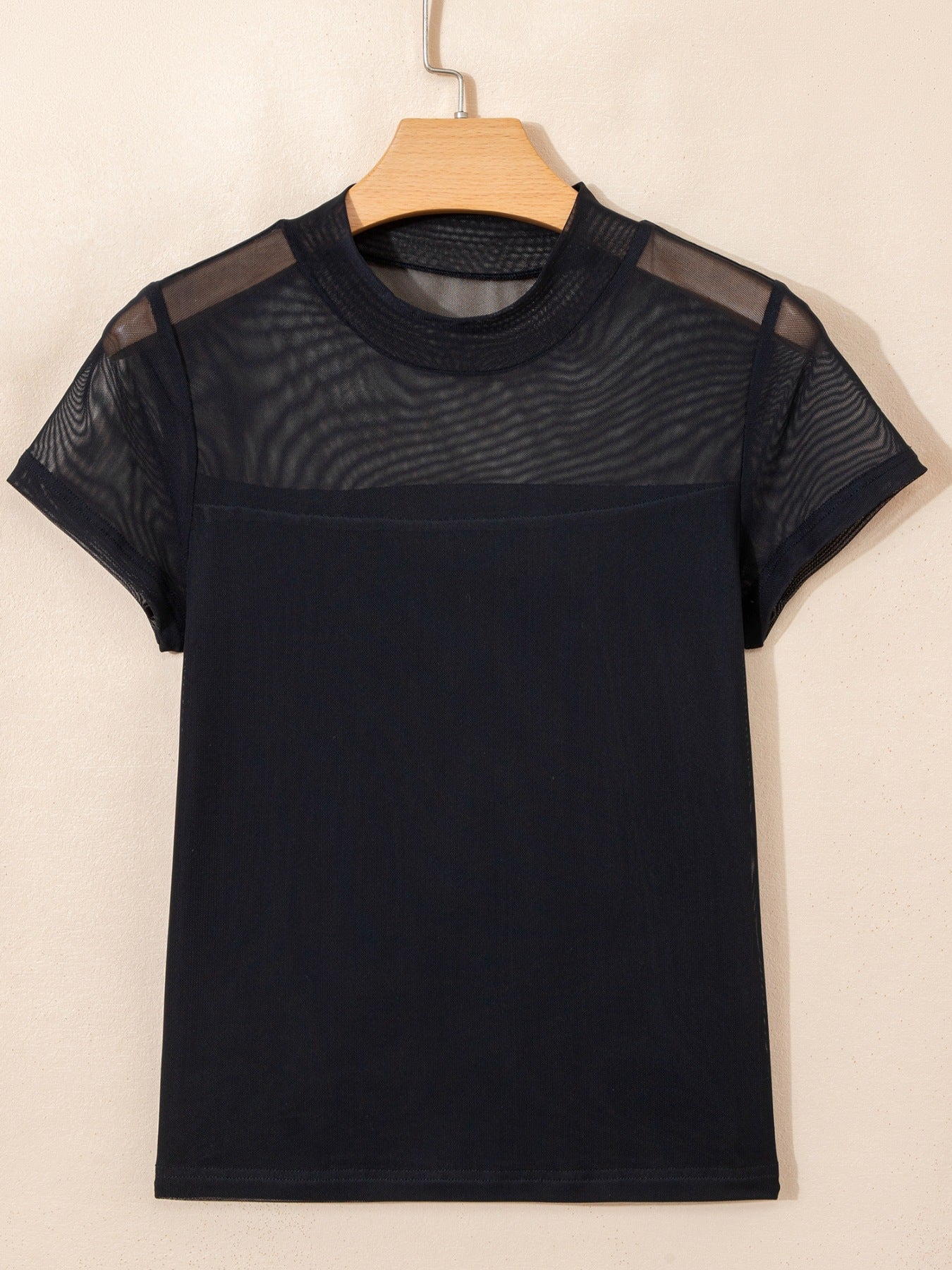 Women's sheer mesh patchwork cap sleeve t-shirt, elegant layering top by Plush Fashion Hub, shown with detailed fabric and cap sleeves.
