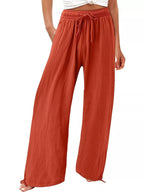 Plus size wide leg pants with drawstring waist from Shopimist, full-length, comfortable, casual fit in neutral fabric.