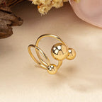 Multi-layered ball ring by Shopimist featuring stacked silver bands with small ball accents on a white background.