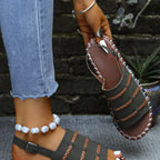 Open toe buckle sandals by Shopimist featuring stylish straps and a comfortable flat sole.