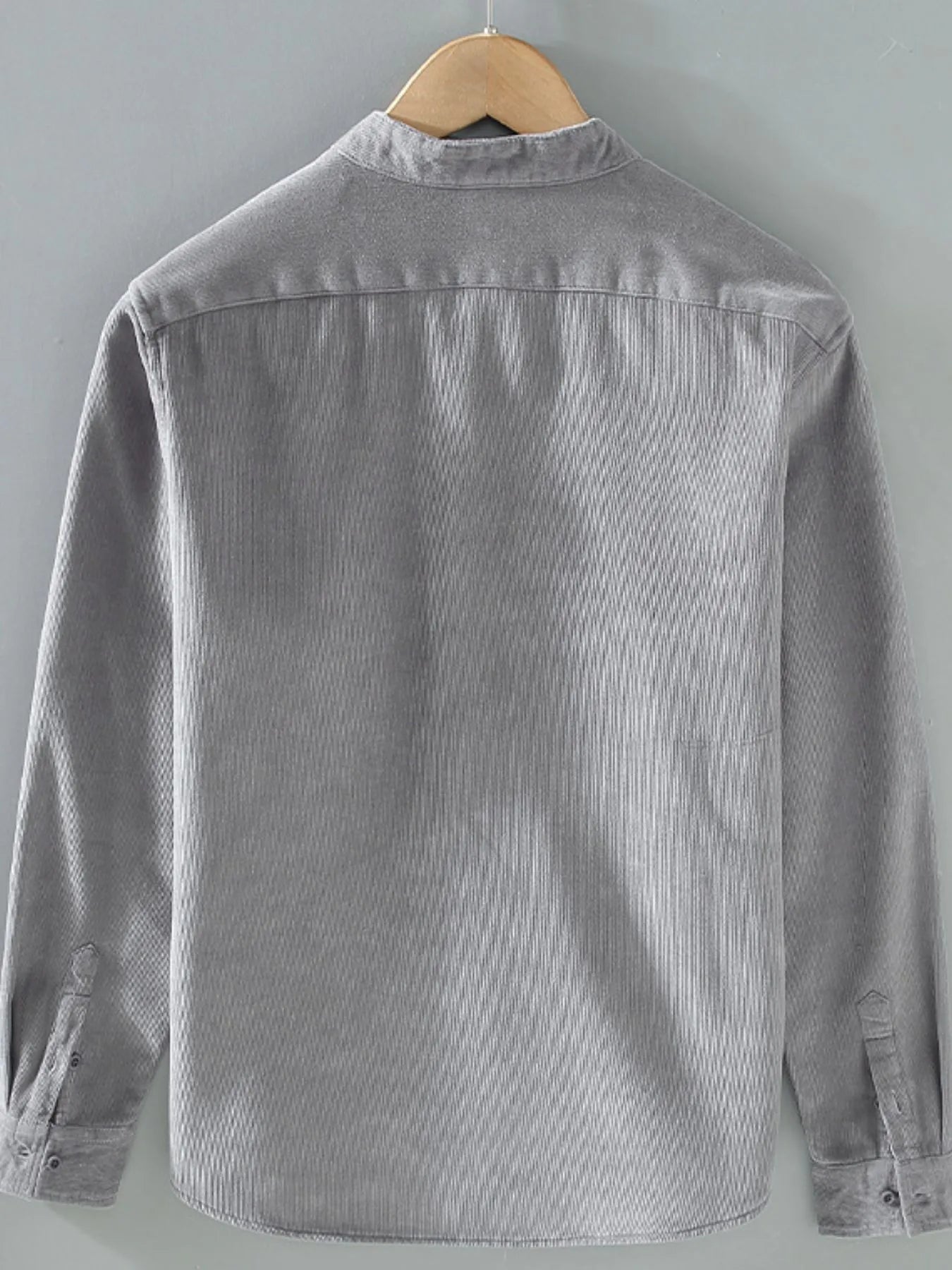 Men's plus size button-up long sleeve jacket by Shopimist, shown in dark fabric with front button closure and collar.