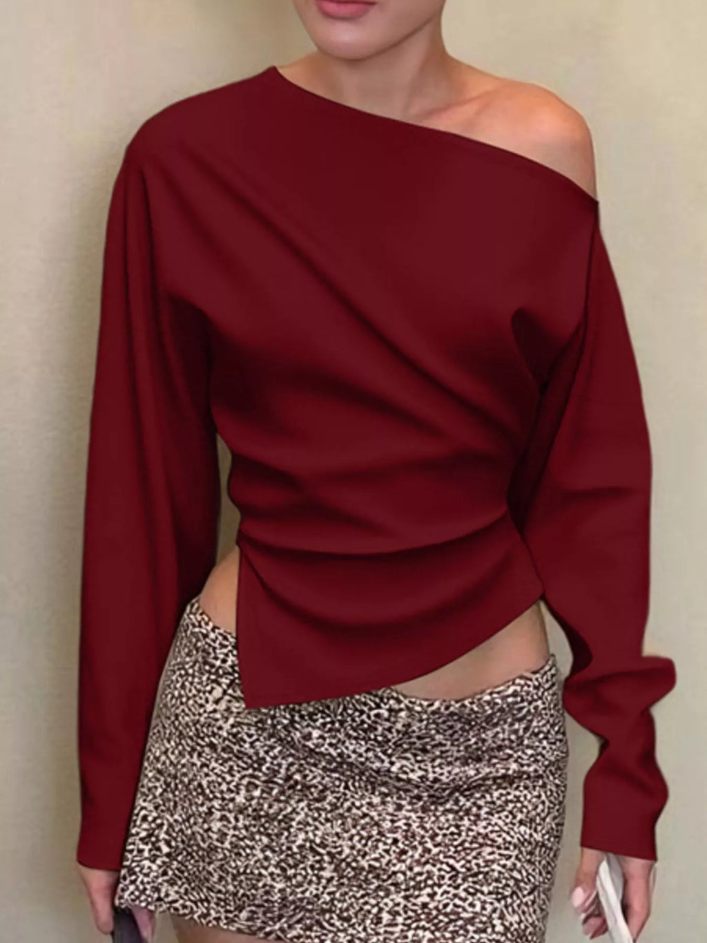 Asymmetrical off-shoulder long sleeve T-shirt from Shopimist, featuring a stylish cut and relaxed fit, shown on a mannequin.