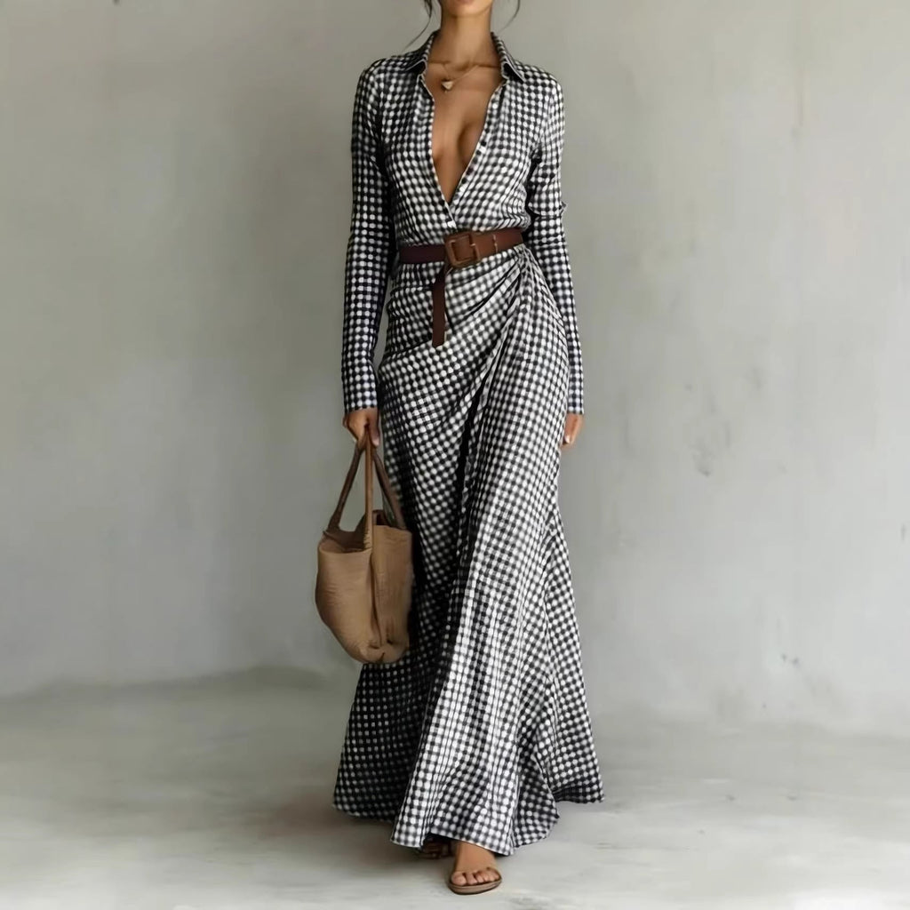 Women's belted irregular pleated dress by Plush Fashion Hub displayed with a flowing fabric and stylish belt detail.