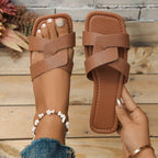 Plush Fashion Hub crisscross strap open toe flat sandals with stylish design and comfortable fit, perfect for casual summer wear.