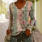 Women's ethnic print V-neck long-sleeve pullover top by FitiqueFit featuring colorful patterns and a comfortable fit.