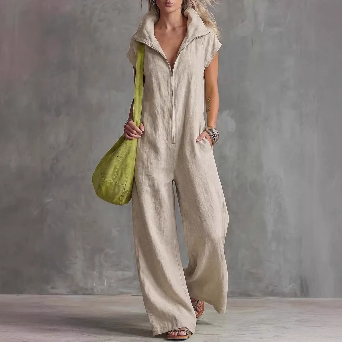 Women's linen-look sleeveless jumpsuit with pockets, casual FitiqueFit jumpsuit perfect for summer and warm weather.