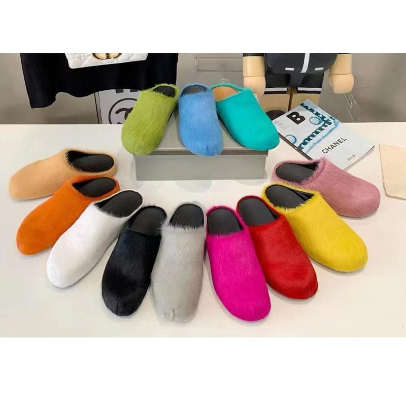 Genuine leather horse hair half slippers by Plush Fashion Hub featuring soft leather and stylish horse hair accents.