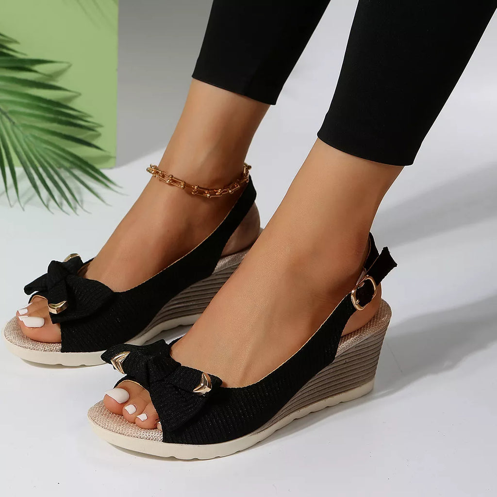 Open toe wedge sandals by Shopimist featuring a stylish design and comfortable heel, perfect for summer footwear.