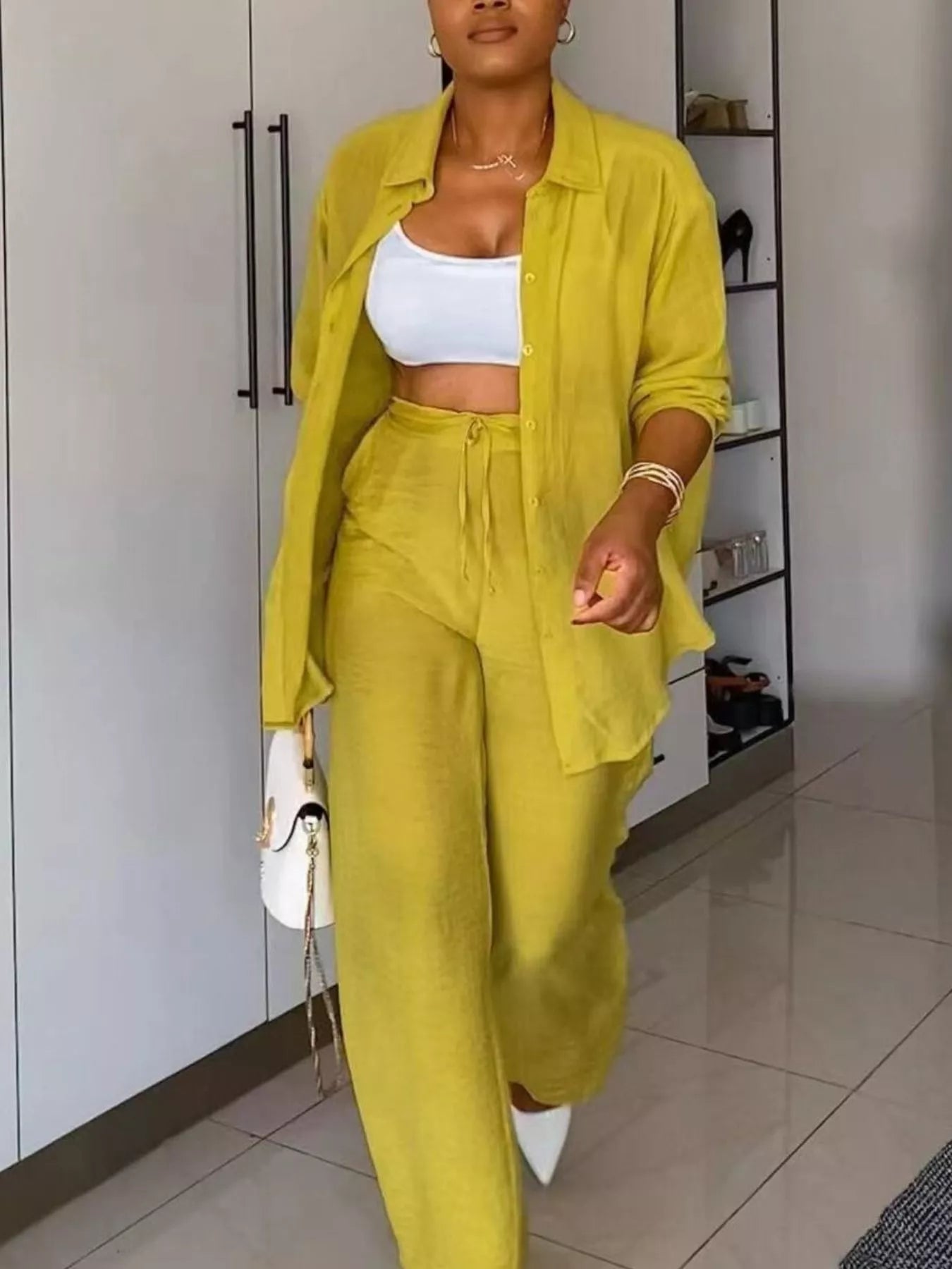 Plush Fashion Hub two-piece set with a tie-front top and wide-leg pants, featuring soft fabric and stylish casual design.