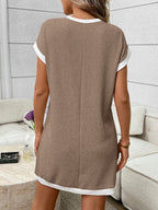Ribbed knit mini dress with contrast trim and functional pocket, stylish dress by Trendsi featuring a fitted silhouette.