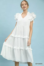 Umgee textured ruffle sleeve tiered midi dress with soft fabric and stylish design, perfect for casual or semi-formal wear.