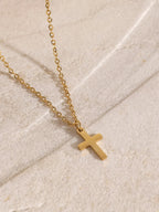 18K gold-plated three-layered cross necklace with delicate chains and detailed cross pendants, perfect for elegant jewelry styling.