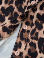 Leopard print short sleeve blouse with lace trim and button front from Plush Fashion Hub, featuring a stylish and casual design.