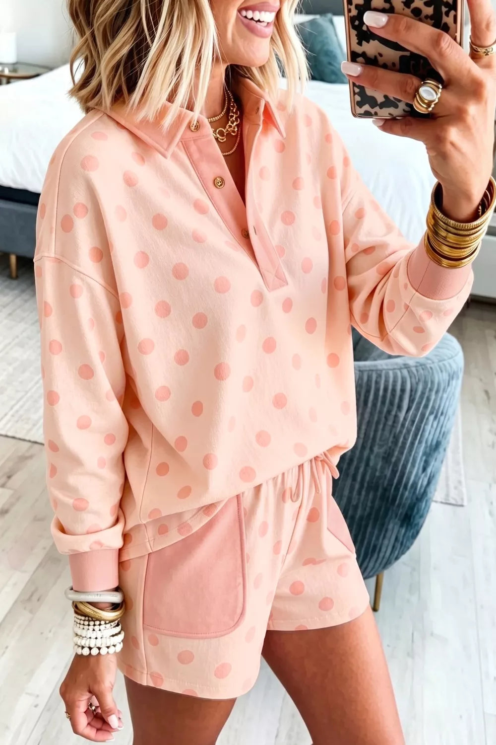 Polka dot drop shoulder polo loose pullover and casual shorts set by Plush Fashion Hub, featuring patch pockets and a relaxed fit.