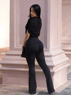 Ruched flare leg jumpsuit by Trendsi featuring a stylish fit and flowy design, perfect for casual or dressy occasions.