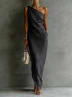Women's satin off-shoulder slim-fit maxi dress by FitiqueFit, featuring a casualwear style with a flowing, elegant silhouette.