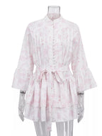 Floral print layered ruffle dress from Shopimist featuring a flowy design and feminine floral patterns.