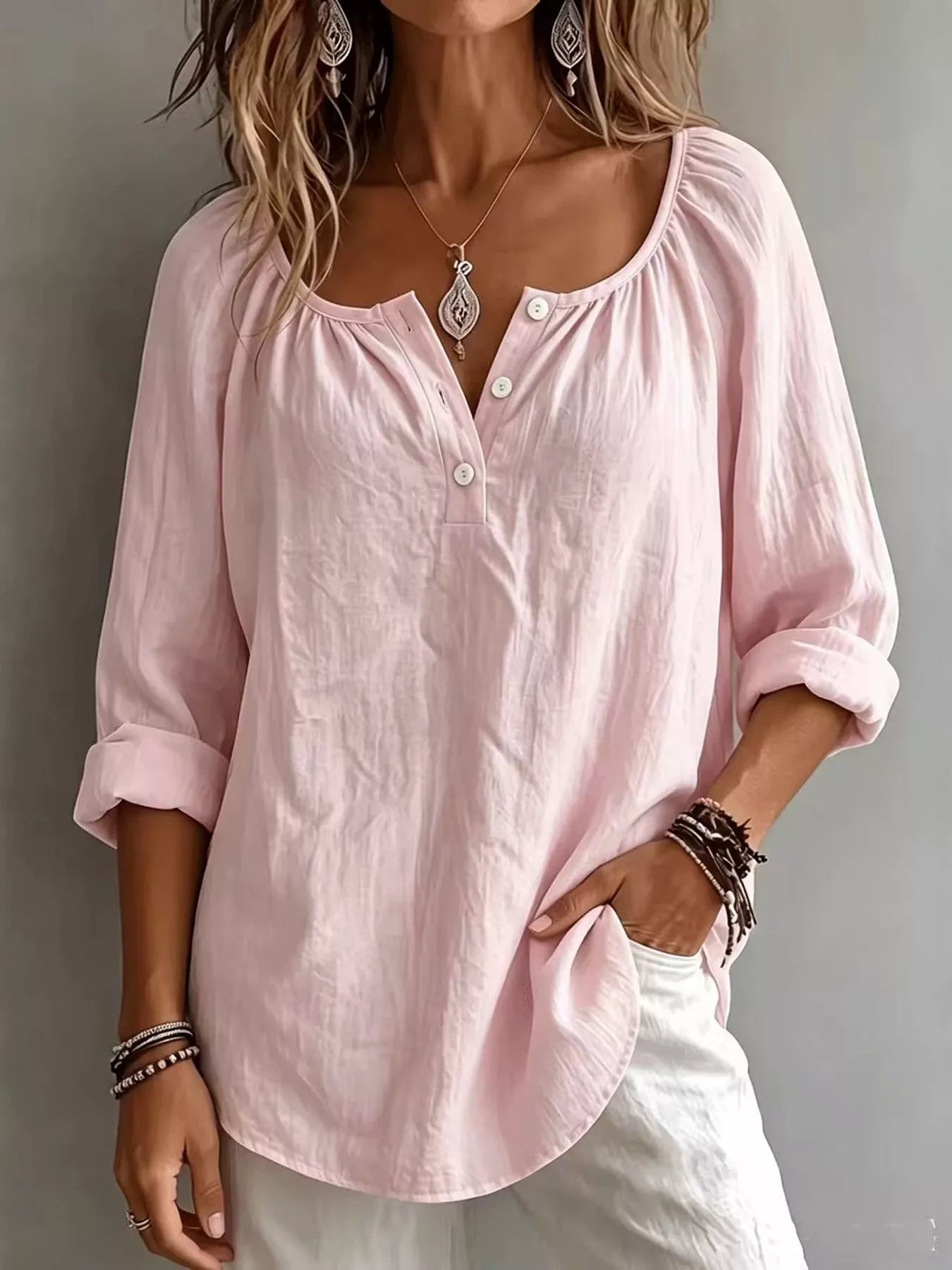 Plush Fashion Hub long sleeve top with button details, soft fabric, and a relaxed fit, shown on a model.