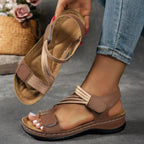 Open toe wedge sandals by Shopimist featuring a stylish design with a comfortable platform and ankle strap in neutral tones.