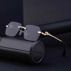 Gold frame cheetah rimless sunglasses by FitiqueFit, featuring hip-hop style eye wear with bold, modern design and unique pattern.