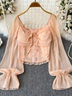 Women's lightweight polyester dress with elegant frill flounce sleeves and smocked bodice, perfect for stylish casual wear.