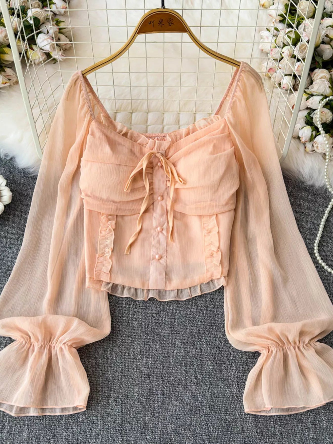 Women's lightweight polyester dress with elegant frill flounce sleeves and smocked bodice, perfect for stylish casual wear.