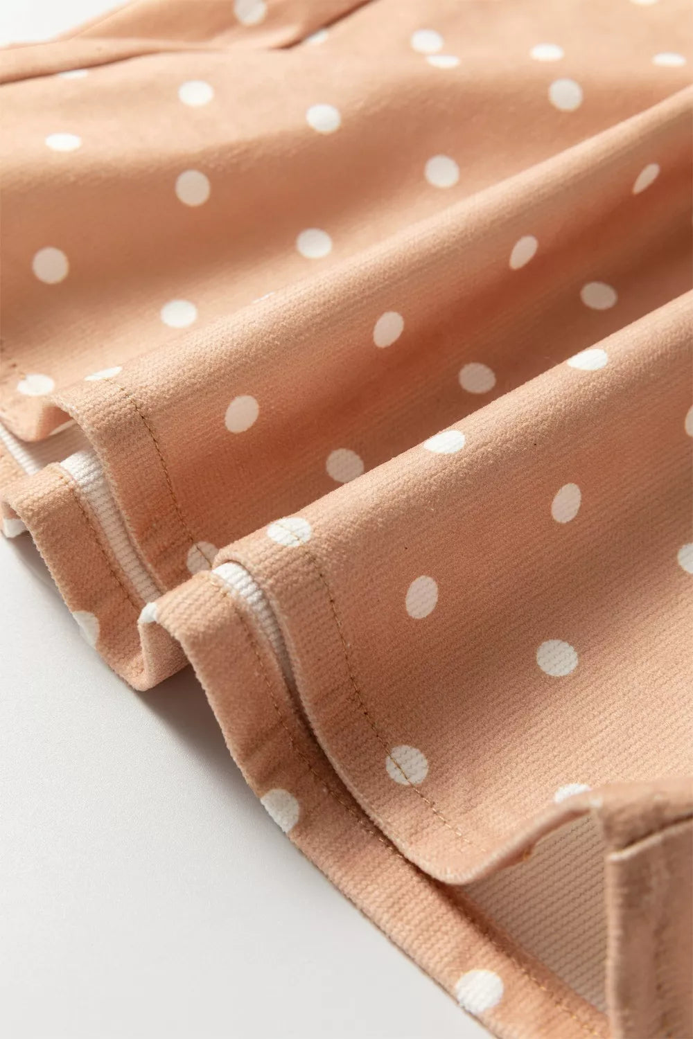 Women's lightweight polka dot wide-leg drawstring dress pants from Trendsi, casual and comfortable with a relaxed fit.