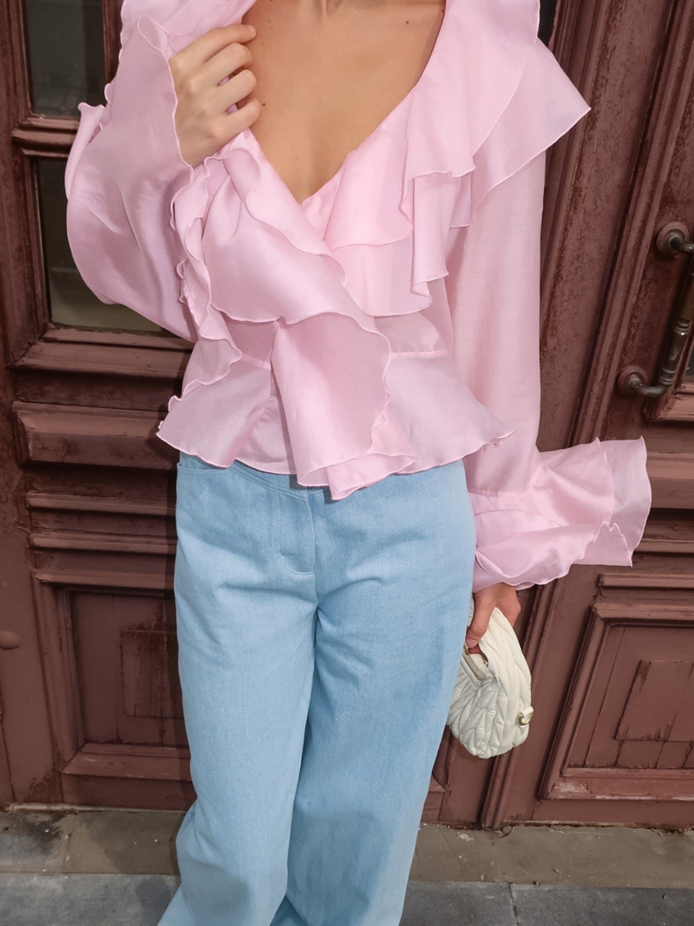 Women's elegant long sleeve blouse with ruffle trim made from soft Tencel blend, stylish and comfortable for any occasion.