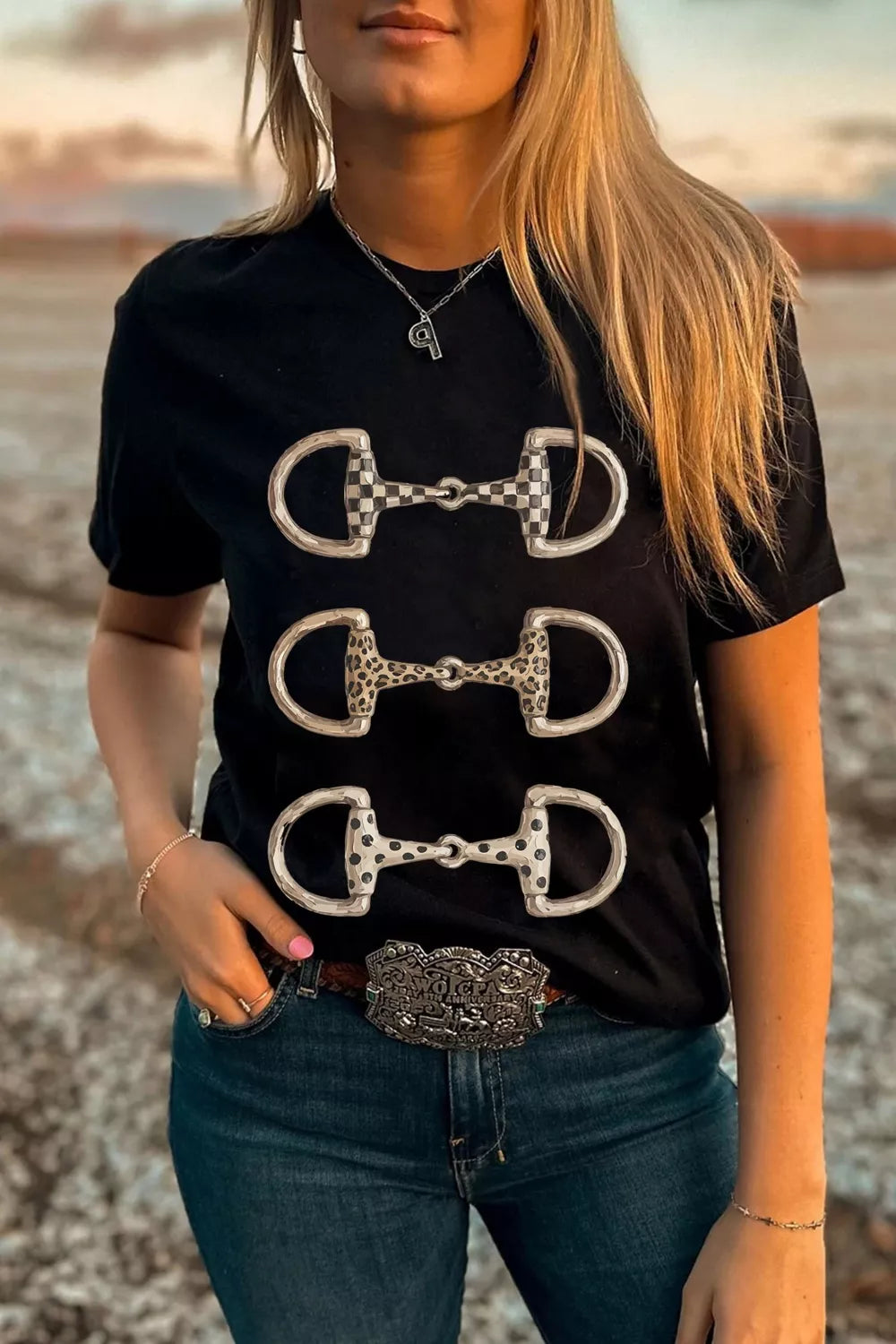 Printed relaxed T-shirt featuring western horse bit graphic by Plush Fashion Hub, casual fit and comfortable fabric.