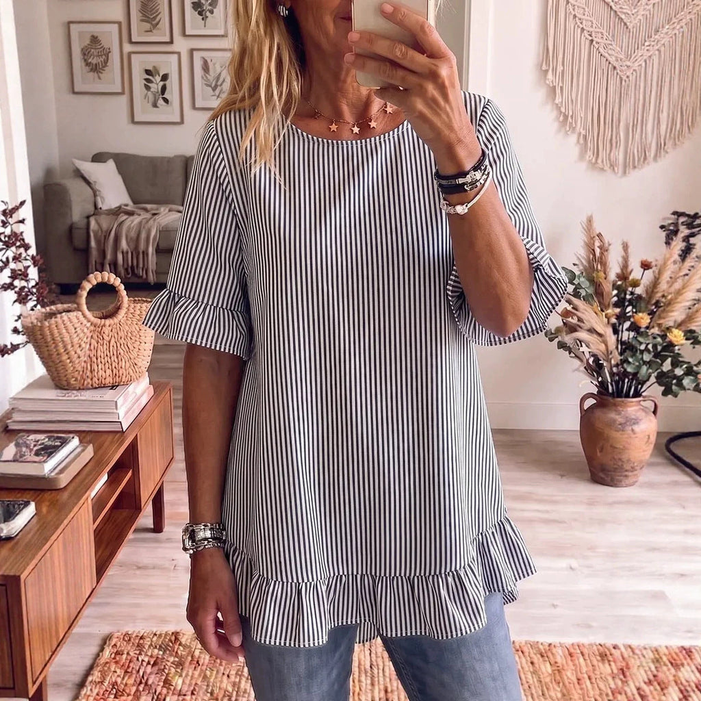Women's striped ruffle-sleeve loose-fit blouse with three-quarter sleeves, casualwear by FitiqueFit, shown on a hanger.