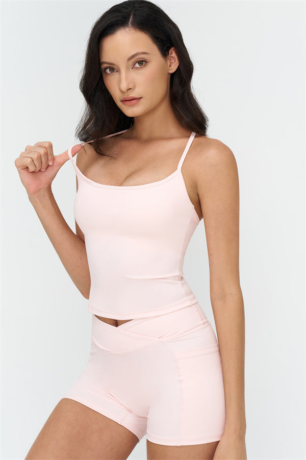 Fitglutes Activewear crop top and shorts 2-piece set, stylish gymwear for workout and sports, shown in a vibrant athletic setting.