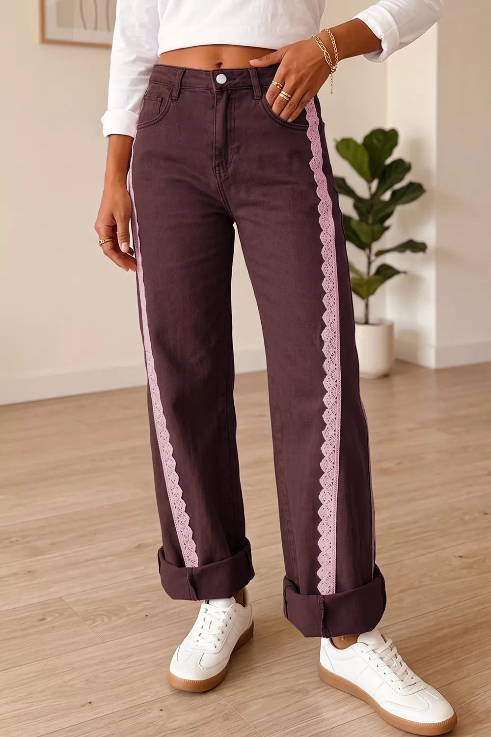 Casual full-length regular fit jeans with lace trim details, made by Trendsi, showcasing the denim fabric and stylish design.